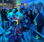 Angora and her family at an amusement park.